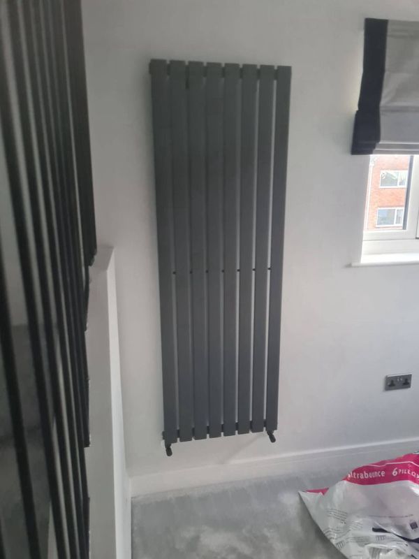 Designer vertical radiator installed Leicester central heating upgrade